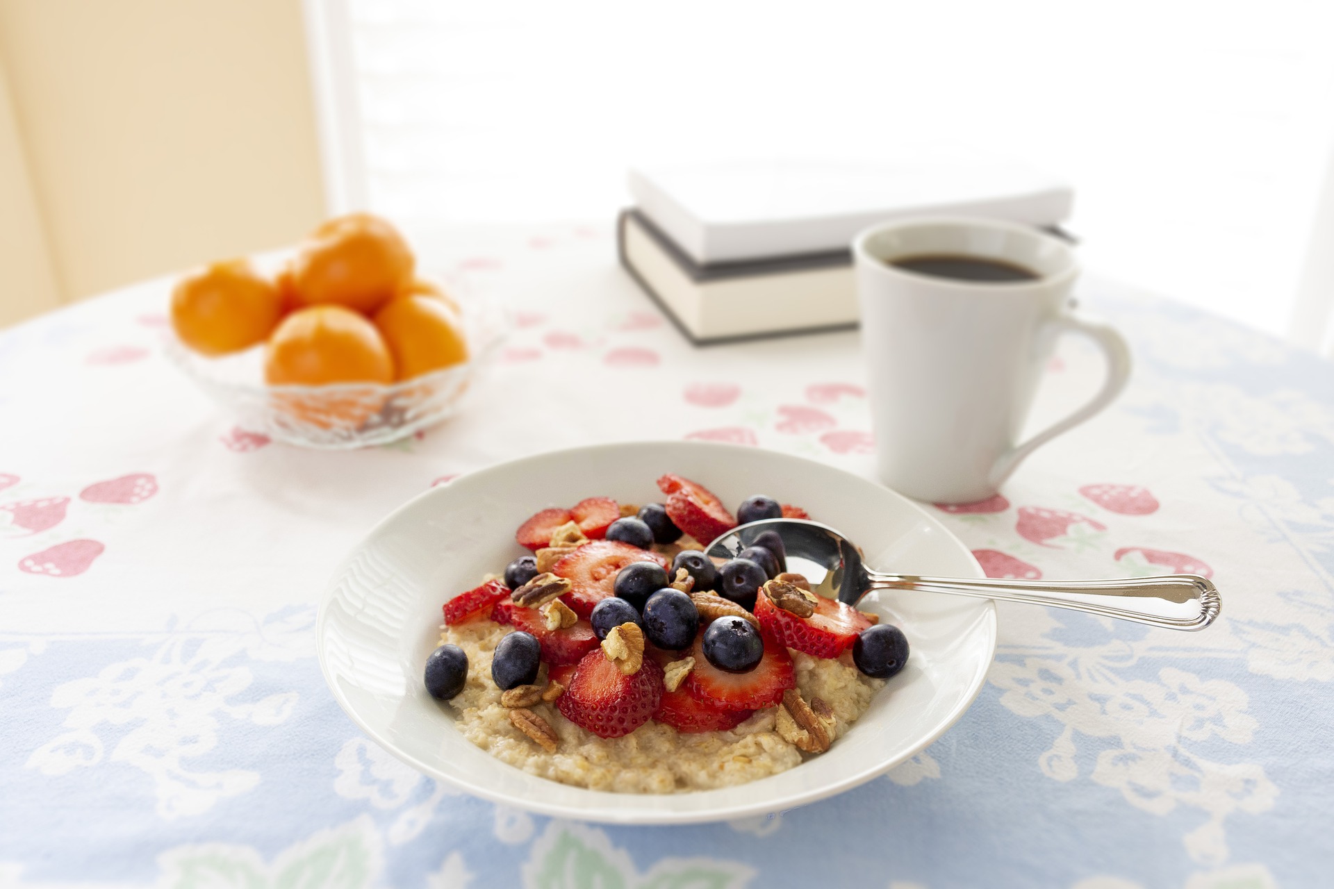 Healthy breakfast still life with coffee on a wooden table, illustrating low-acid coffee options.
