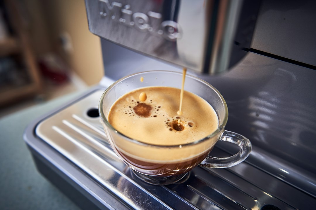 Espresso shot and drip coffee side by side illustrating espresso machine vs coffee maker.