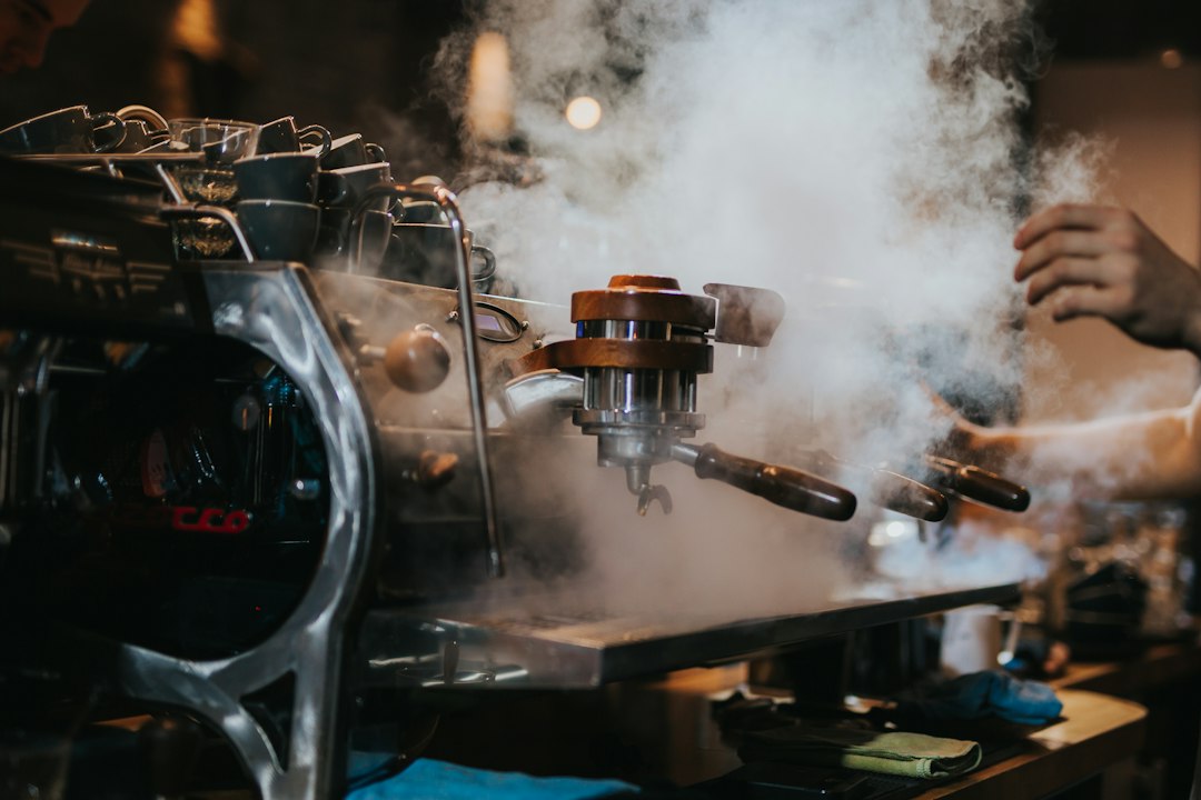 Home espresso machine on a counter illustrating the Ninja Luxe Café review.