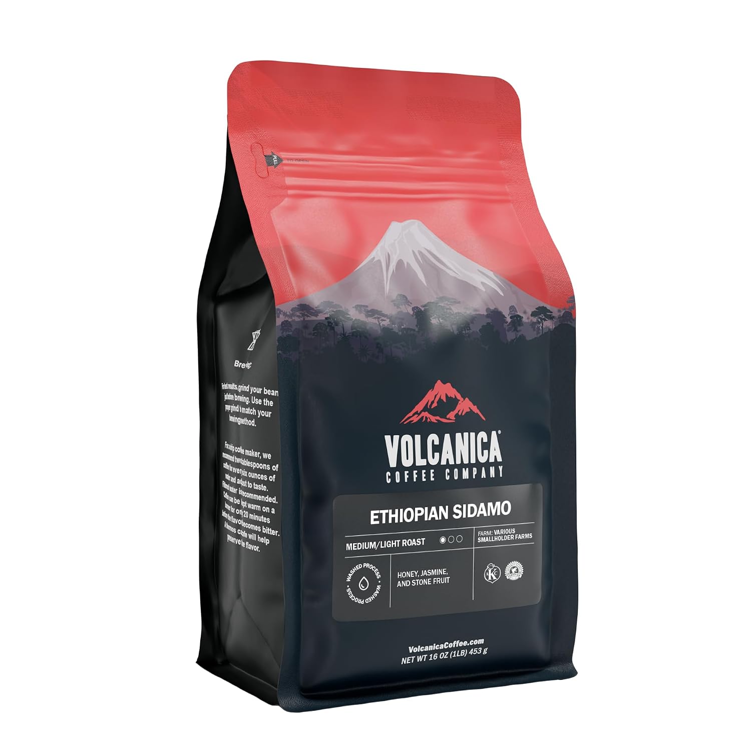 Woven basket tray of Ethiopian Sidamo beans beside a ceramic pour-over, red grapes and dried rose petals.