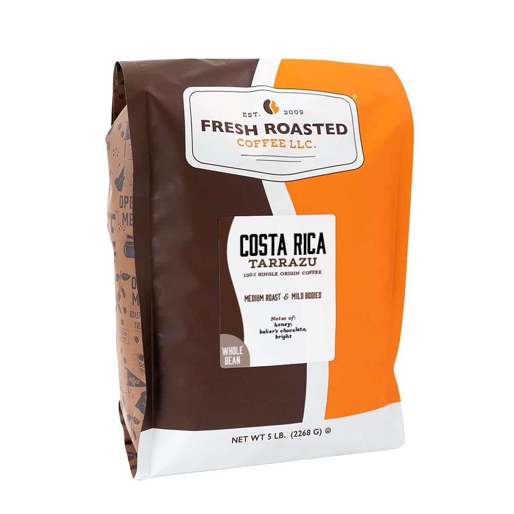 Large bulk bag of medium roast beans with a scoop and three tasting cups of coffee on a cafe back counter.
